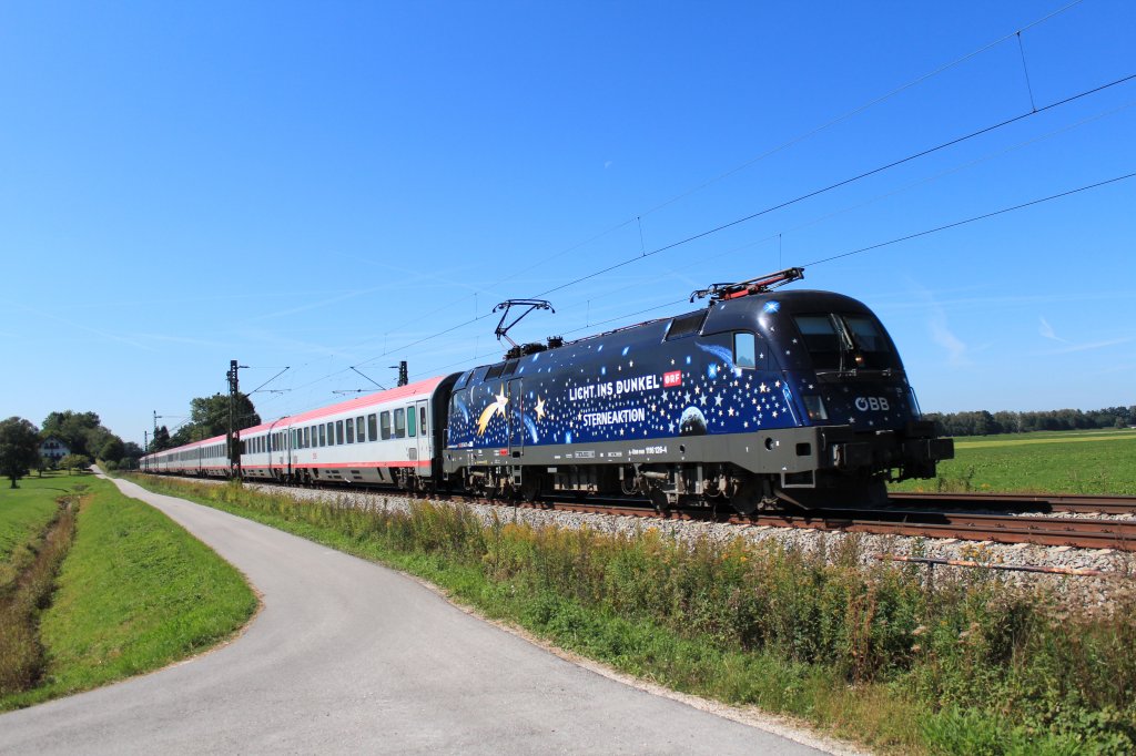 1116 126-4  Licht ins Dunkel  auf dem nach Salzburg. Aufgenommen am 9. September kurz vor �bersee am Chiemsee.