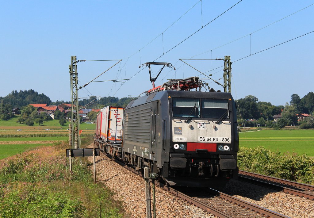 ES 64 F4-806 ist am 10. September 2012 mit einem G�terzug in Richtung Salzburg unterwegs. Aufgenommen zwischen Prien am Chiemsee und Bernau.