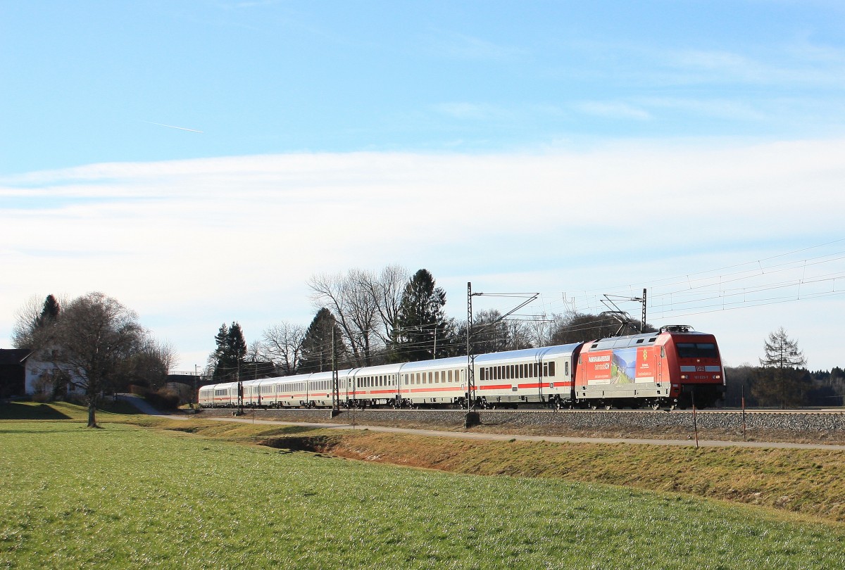 101 029-7 mit dem EC 115 am 15. Februar 2014 bei �bersee am Chiemsee.