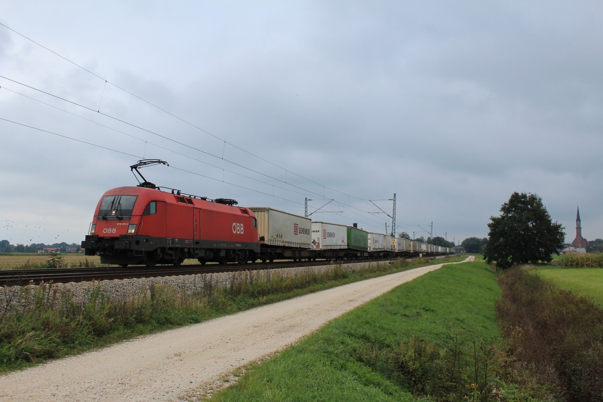 10116 031-5 mit einem Containerzug aus Salzburg kommend am 30. September 2012 bei �bersee.