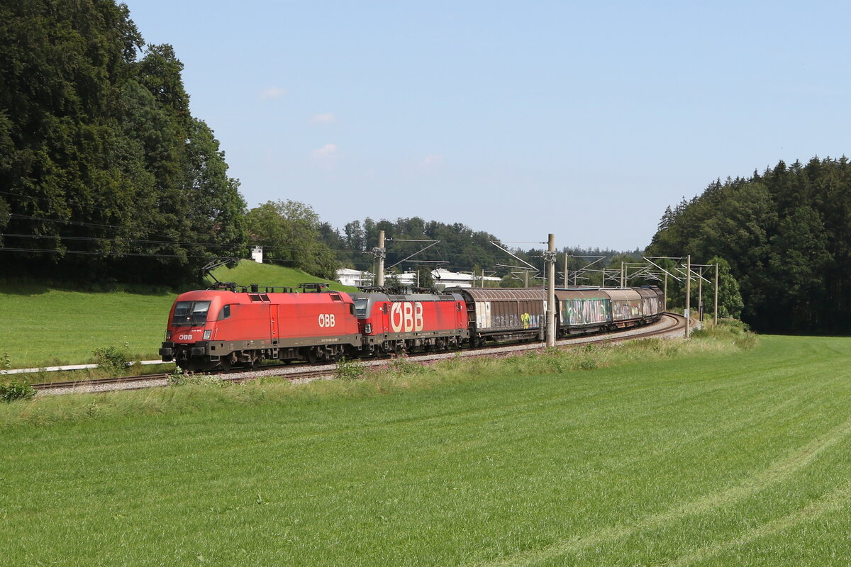 1016 008 und 1293 022 waren am 7. August 2024 bei Axdorf in Richtung M�nchen unterwegs.