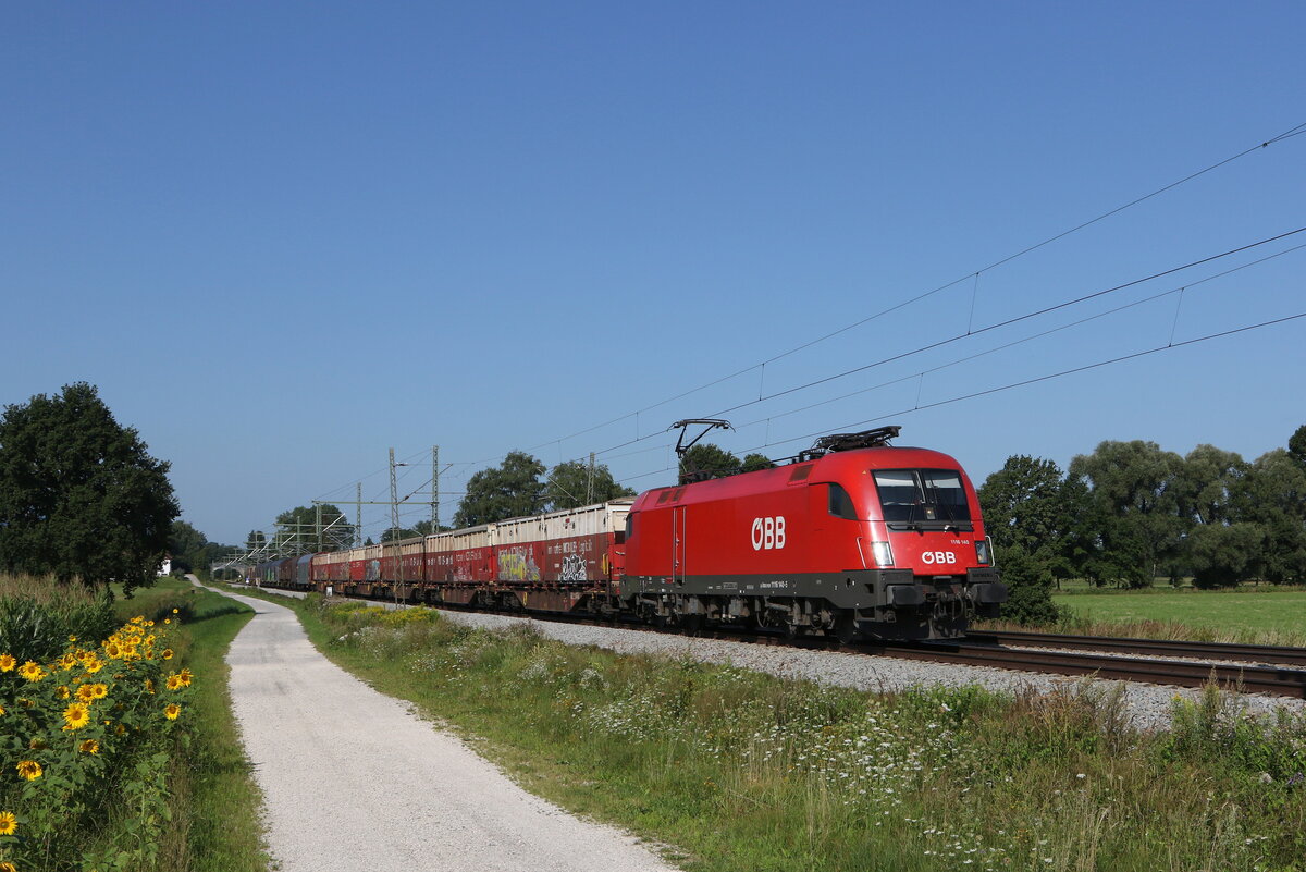 1116 140 war am 11. August 2021 mit einem  Mischer  bei �bersee am Chiemsee in Richtung Salzburg unterwegs.