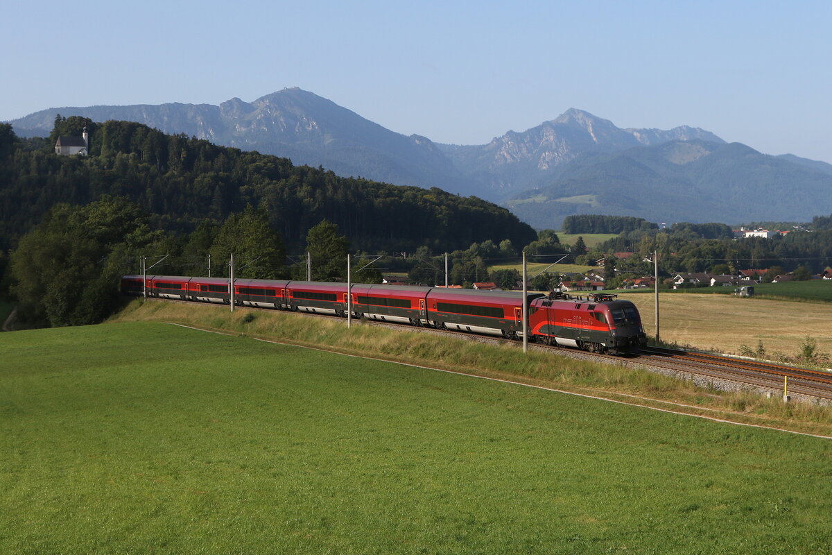 1116 219 war am 19. August 2025 bei Vachendorf im Chiemgau in Richtung Salzburg unterwegs.