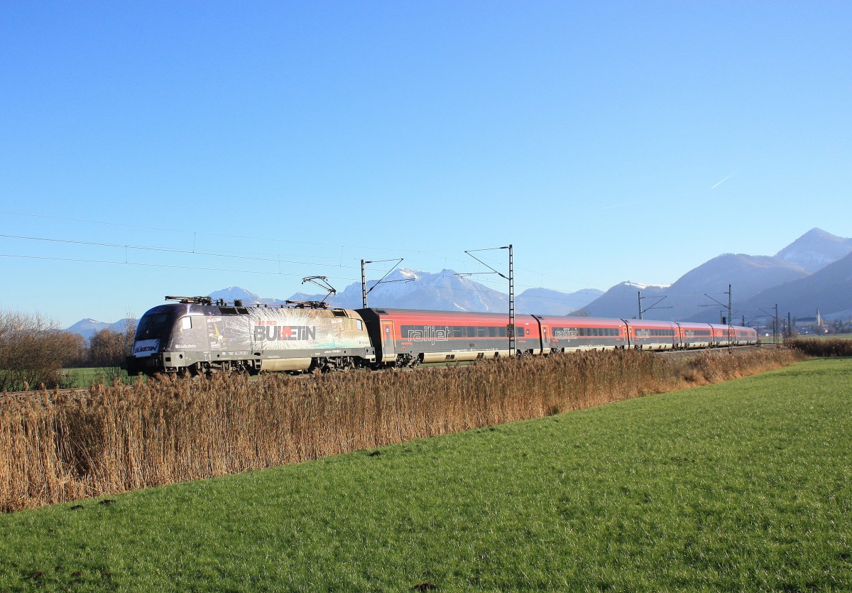 1116 222  RED Bulletin  an der Zugspitze eines Railjets auf dem Weg nach München.
Aufgenommen am 2. Dezember 2013 bei Bernau am Chiemsee.