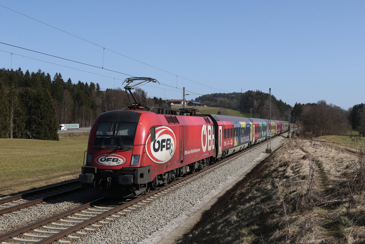 1116 249 war mit dem  �FB-Railjet  am 25. Februar 2021 bei Grabenst�tt im Chiemgau auf dem Weg nach Salzburg.