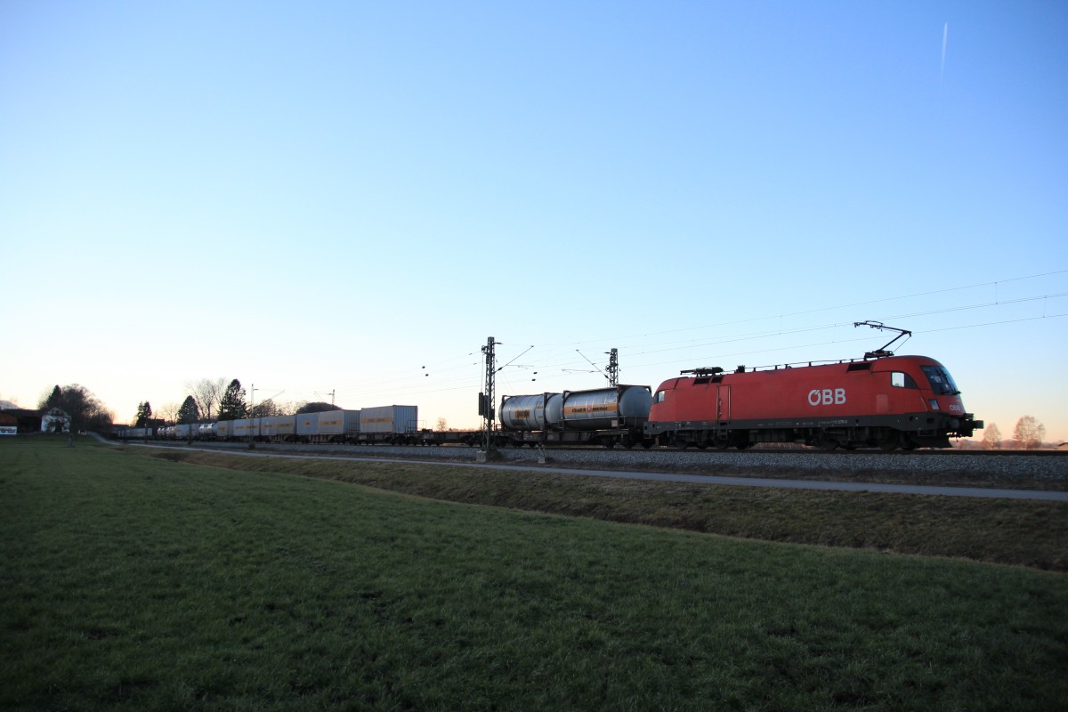 1116 278-3 war am 31. Dezember 2013 mit einem Containerzug bei �bersee in Richtung Salzburg unterwegs.