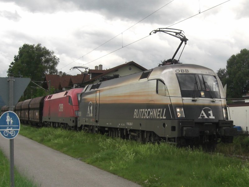 1116 280-7 als  A1  mit einem G�terzug vom Zementwerk in
Rohrdorf in Richtung Rosenheim unterwegs. Aufgenommen am 
10. Juli 2009 in Thansau.