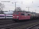 151 144 passiert mit einem kesselwagen-zug am bew�lkten nachmittag des 27.01.2012 den  bf k�ln west.